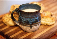 Load image into Gallery viewer, Tea Cup Clay Pottery Mug With Thumb Rest with biscuits