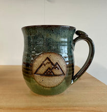 Load image into Gallery viewer, Pottery Mug with Mountains Adventure Mug Functional Ceramics thumb rest Clay mug in blue and green outdoors camping mug