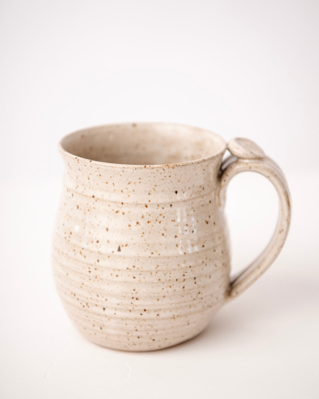 Matte white coffee mug cup with thumb rest