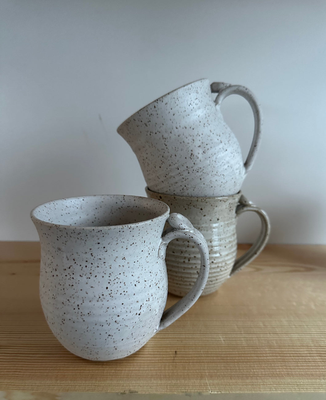 Matte white coffee mug cup with thumb rest
